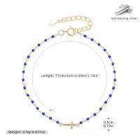 Gold Blue Bead Cross Charm Bracelet