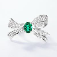Silver Bow Emerald Statement Ring