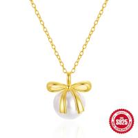 Gold Bow Pearl Pendant Necklace