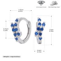 Silver Huggie Earrings with Blue Zircon