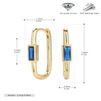 Gold Huggie Earrings with Blue Zircon
