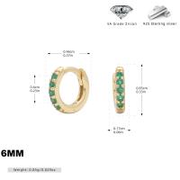 Gold Huggie Earrings with Green Zircon