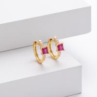 Gold Huggie Earrings with Red Stones