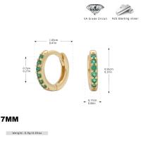 Gold Huggie Earrings with Green Zircon