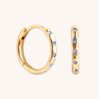 Gold Huggie Earrings with Blue Stones