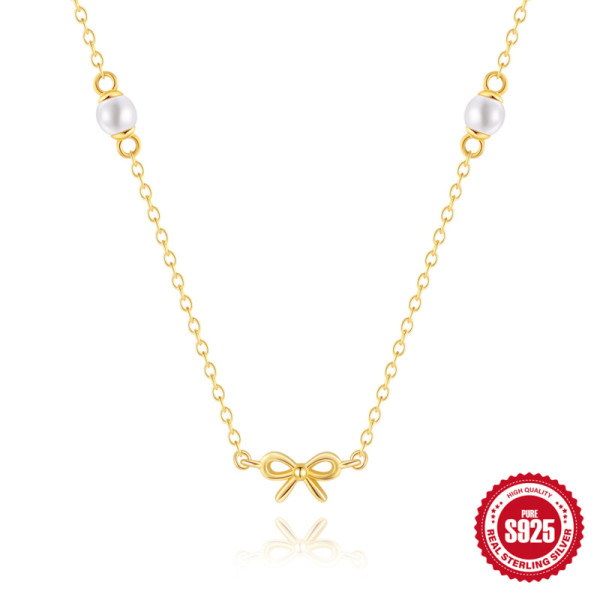 Gold-Plated Bow Pendant Necklace with Pearls