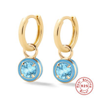 Gold Huggie Earrings with Blue Crystal