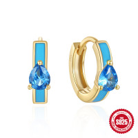Gold Huggie Earrings with Blue Crystal