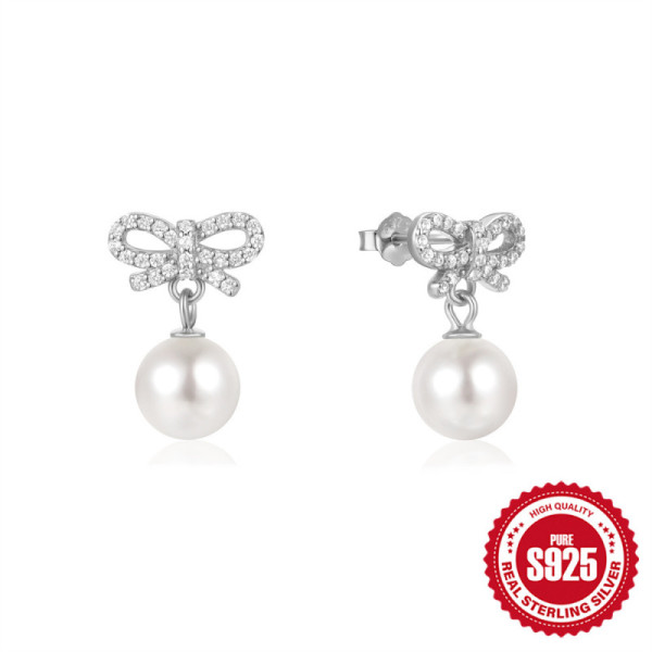 Sterling Silver Bow Pearl Stud Earrings